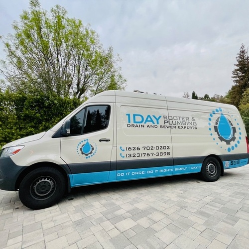 Plumbing Company Van for 1 Day Rooter & Plumbing.